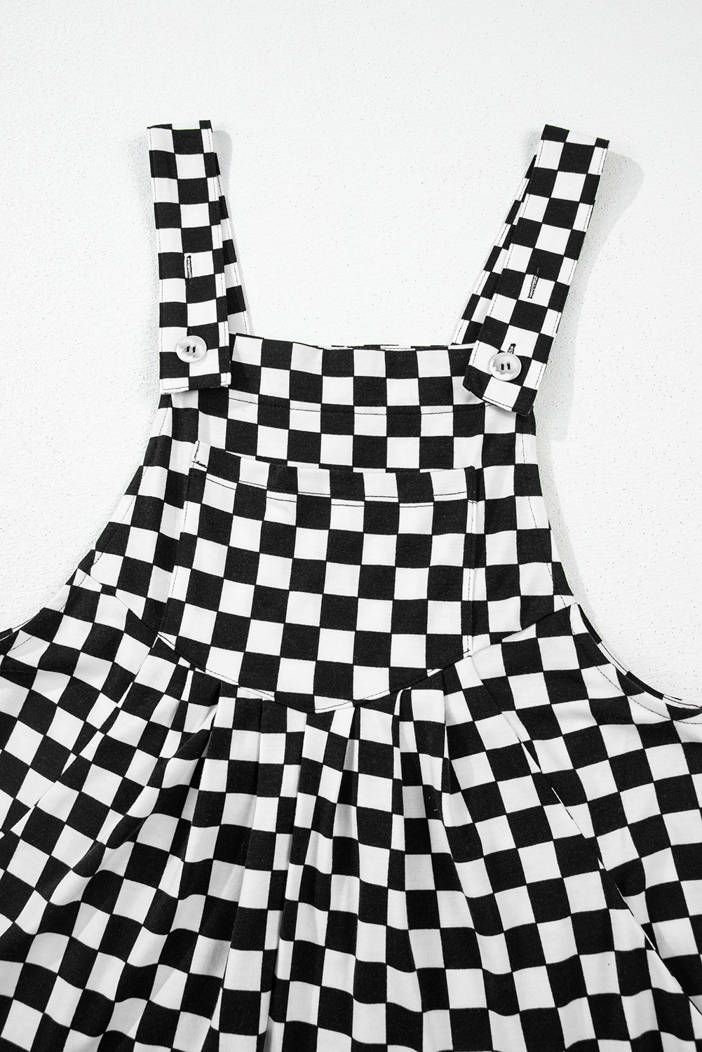Black and white checkered dress on a white background