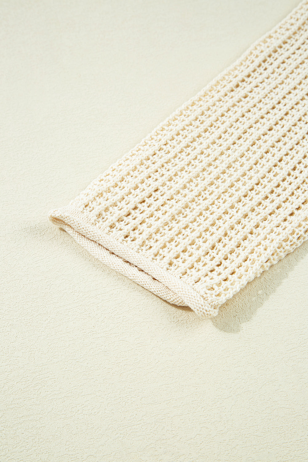Beige woven mat on a light beige background