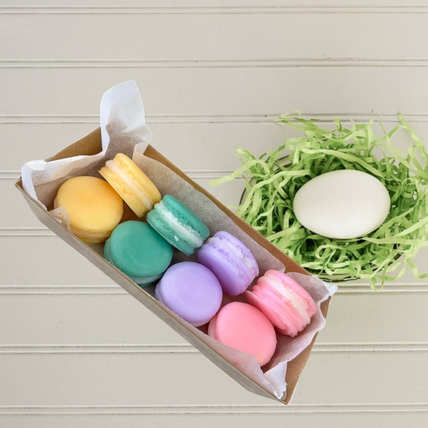 Doodlations Coffee Bar & Boutique Easter Macaroon Wax Melts in pastel yellow, teal, lavender, and pink.