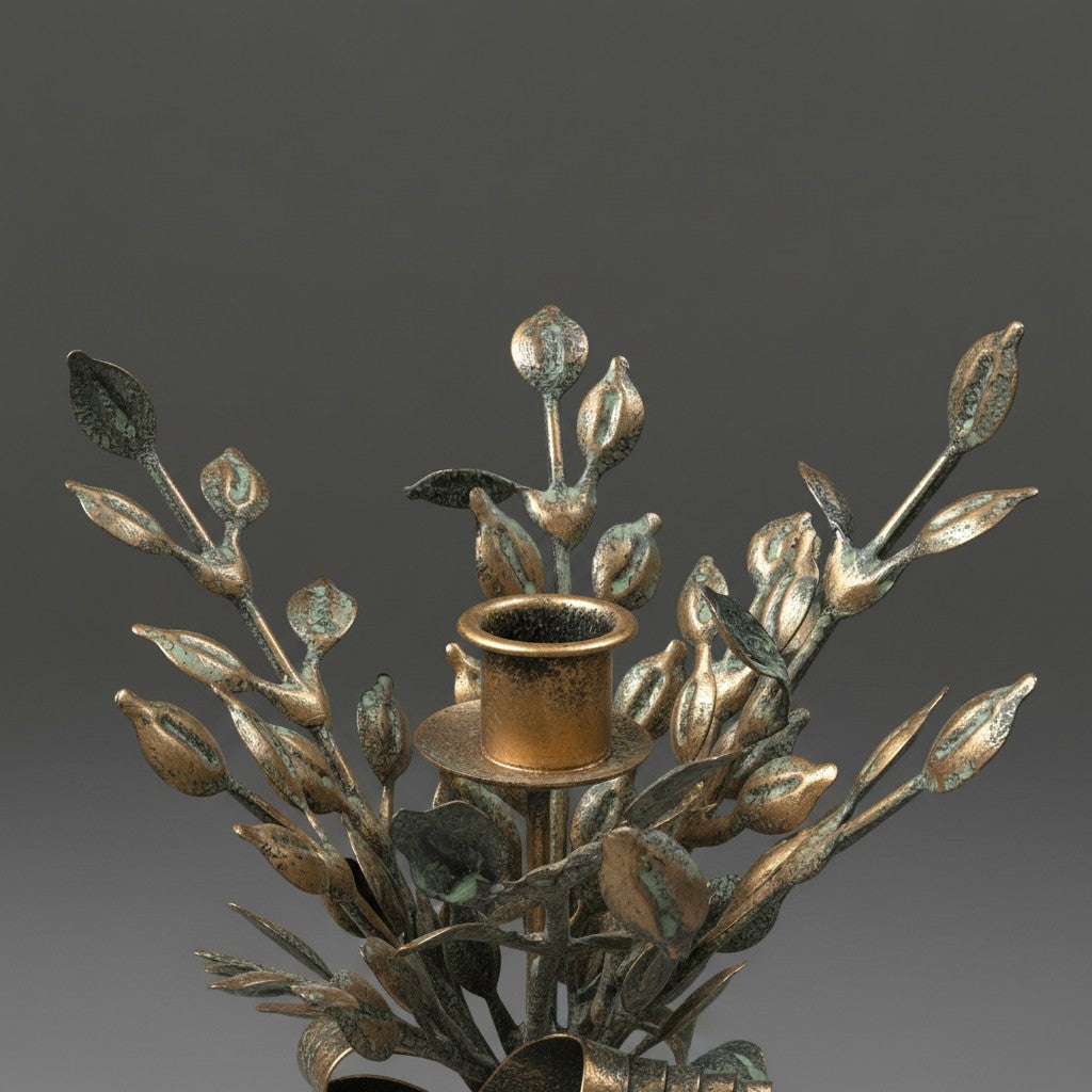 Doodlations Coffee Bar & Boutique brass leaf motif candleholder, 11 inches tall, antique gold finish with verdigris accents.