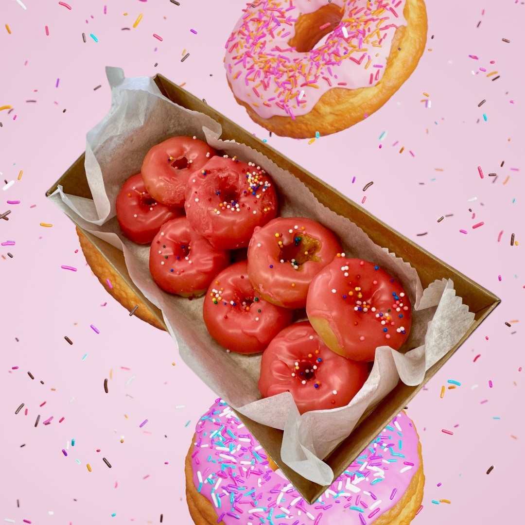 Doodlations Coffee Bar & Boutique Cherry Glazed Doughnut Wax Melts with pink glaze and colorful sprinkles.