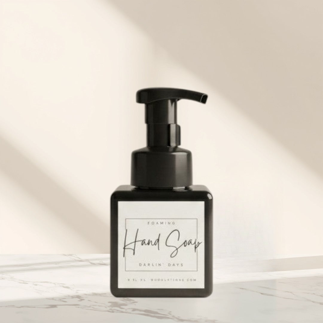 Doodlations Coffee Bar & Boutique Darlin Days foaming hand soap in a black bottle with a white label.