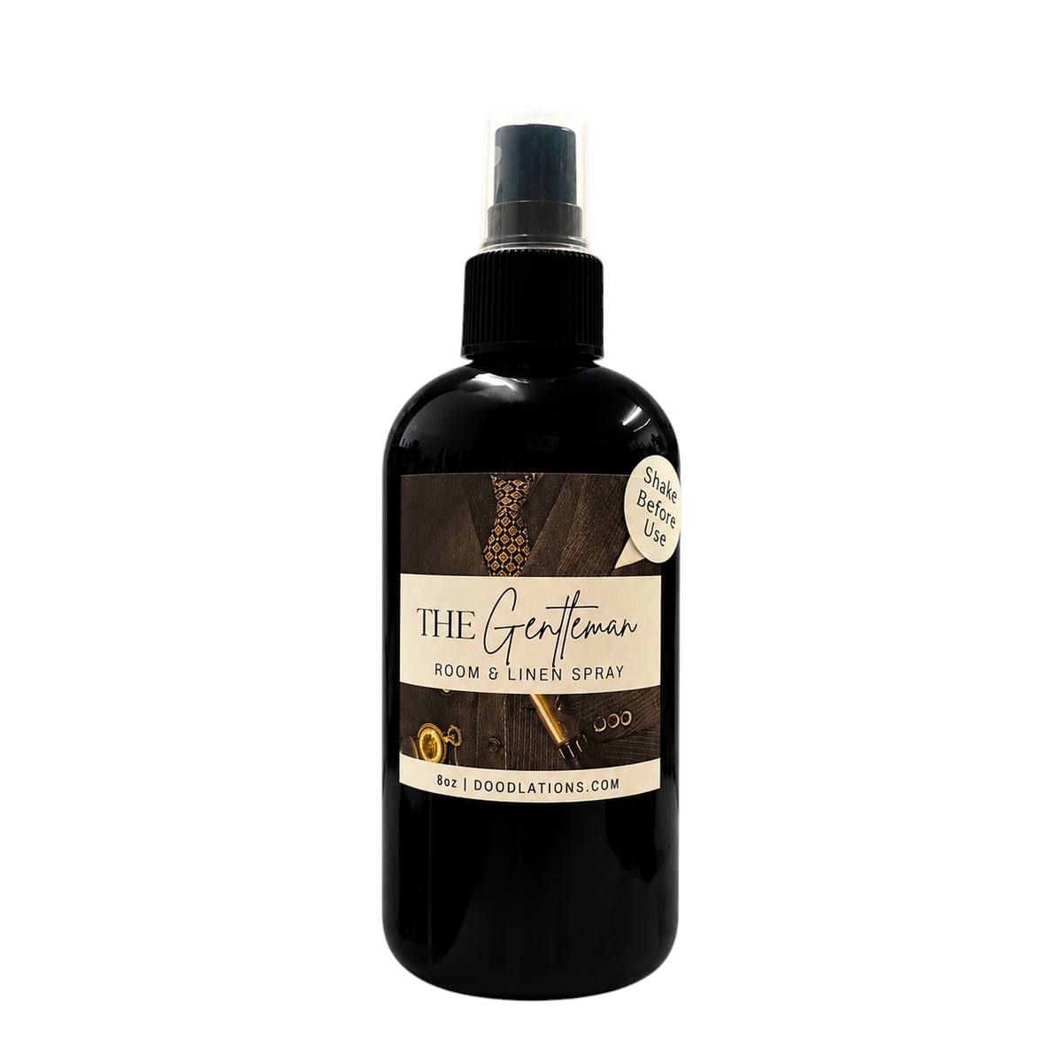 Doodlations Coffee Bar & Boutique The Gentleman room and linen spray in an 8oz black bottle with a spray nozzle.