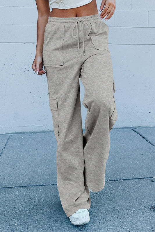 Doodlations Coffee Bar & Boutique light grey cotton blend wide leg cargo sweatpants with drawstring waist and multiple pockets.