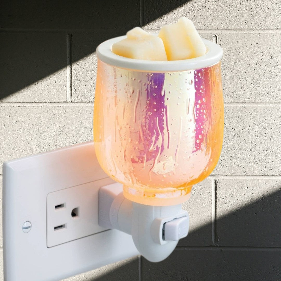 Doodlations Coffee Bar & Boutique iridescent plug-in wax warmer with textured glass and wax melts.