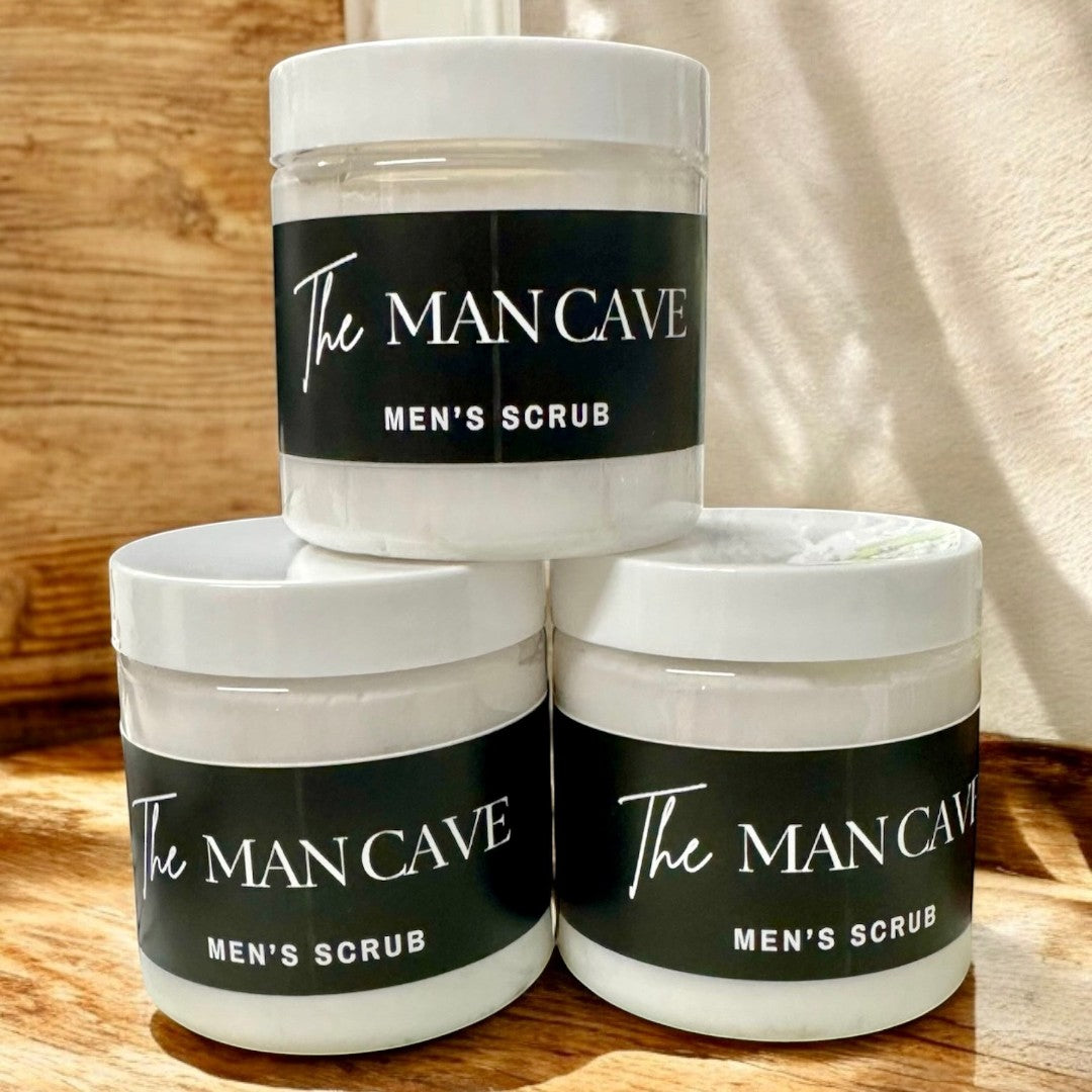 Doodlations Coffee Bar & Boutique The Man Cave Men's Scrub, white whipped soap in clear jars with black labels.