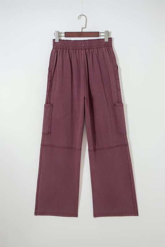 Doodlations Coffee Bar & Boutique merlot mineral wash cargo sweatpants with raw seams and an elastic drawstring waist.