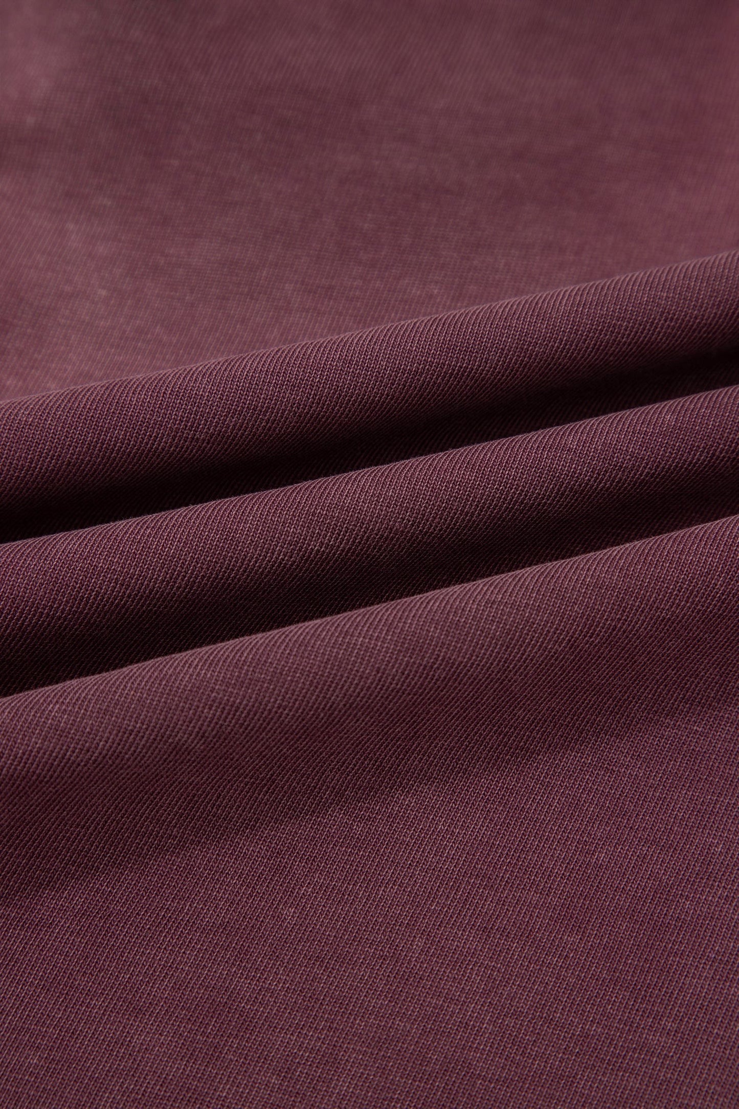 Doodlations Coffee Bar & Boutique merlot mineral wash fabric texture with soft folds and a lived-in aesthetic