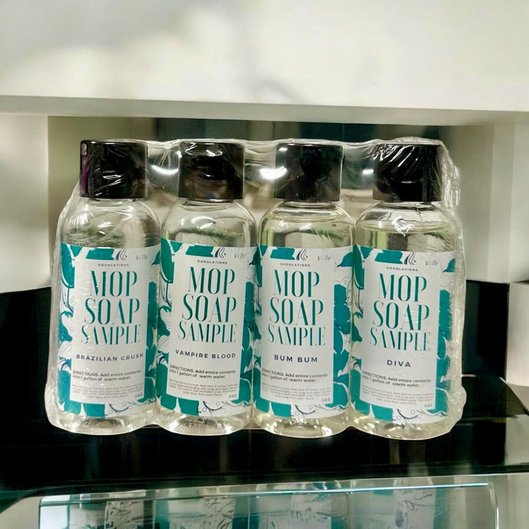 Doodlations Coffee Bar & Boutique Mop Soap Sample Pack featuring four 3 oz bottles with black caps and teal labels.