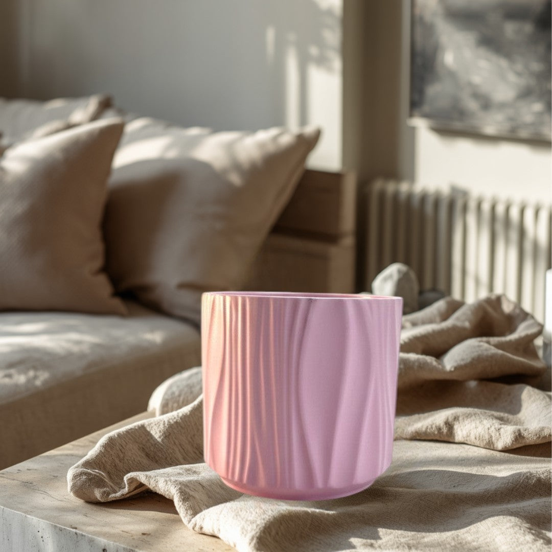 Doodlations Coffee Bar & Boutique pink marbled concrete candle with wavy texture. 4oz soy blend wax.
