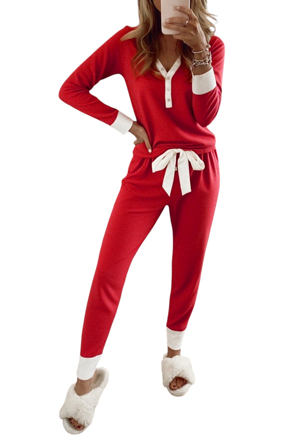 Doodlations Coffee Bar & Boutique fiery red pajama set with white contrast trim, button V-neck, and knot waist detail.