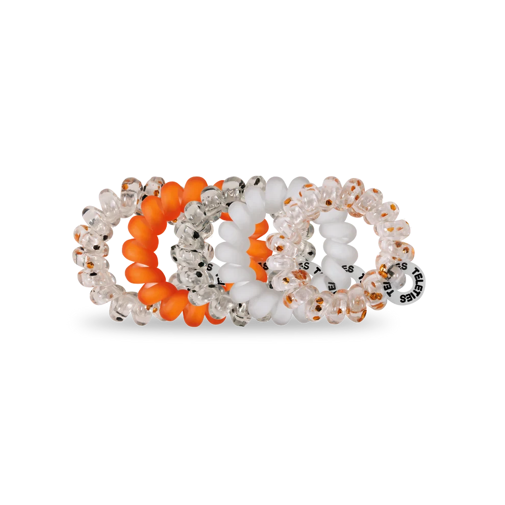Doodlations Coffee Bar & Boutique Spooky Sparkles hair ties in black, orange, and clear spiral designs.