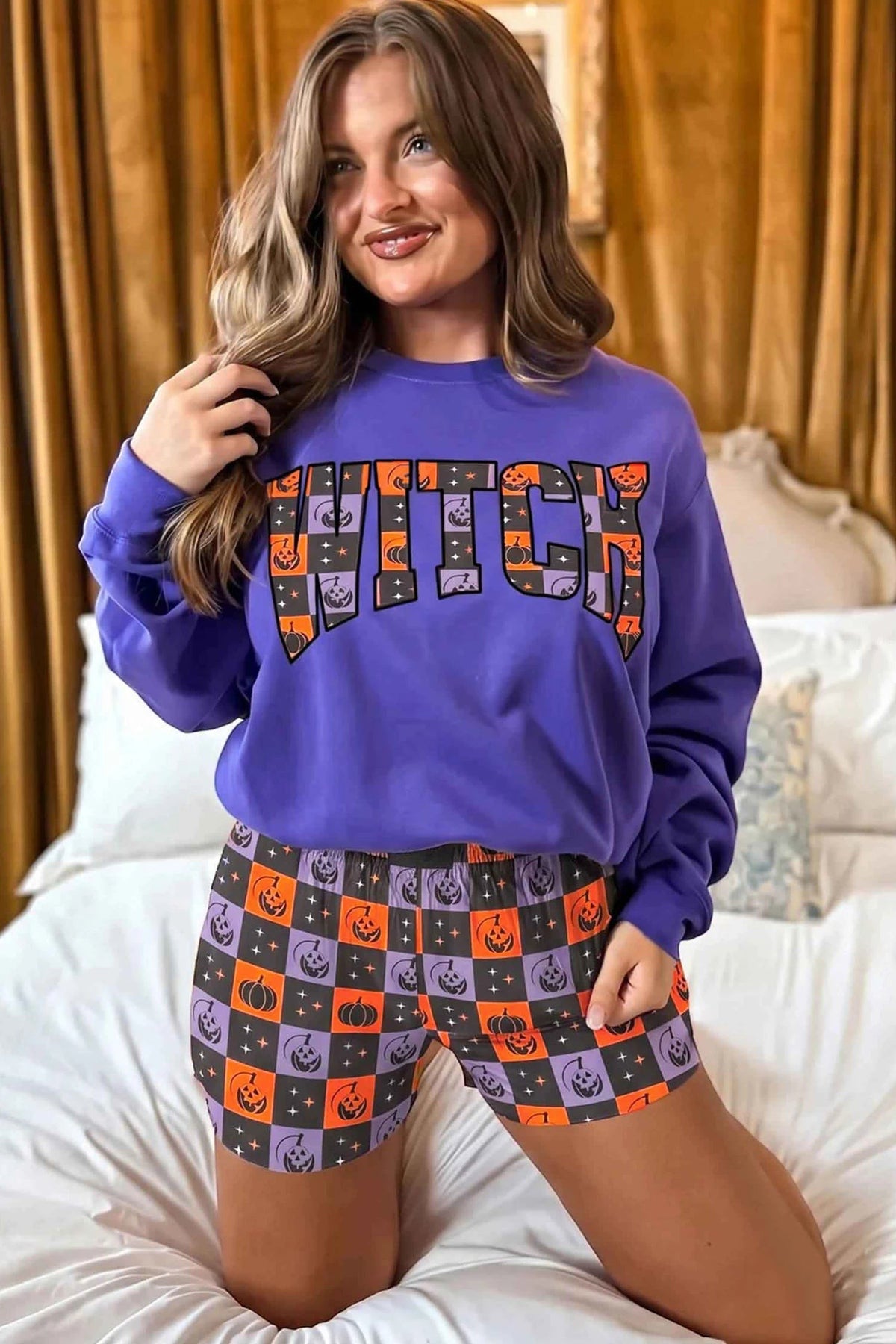 Doodlations Coffee Bar & Boutique purple long sleeve witch sweatshirt and orange checkered pumpkin print shorts set