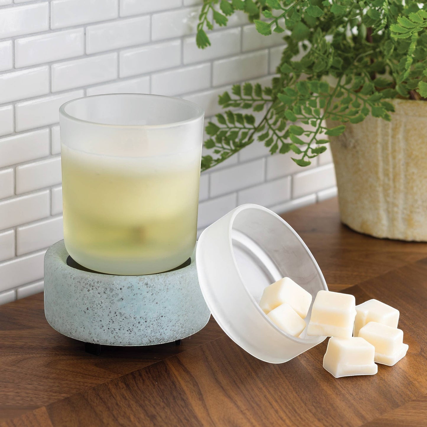 Doodlations Coffee Bar & Boutique frosted glass wax warmer with blue-green textured base and wax melts.