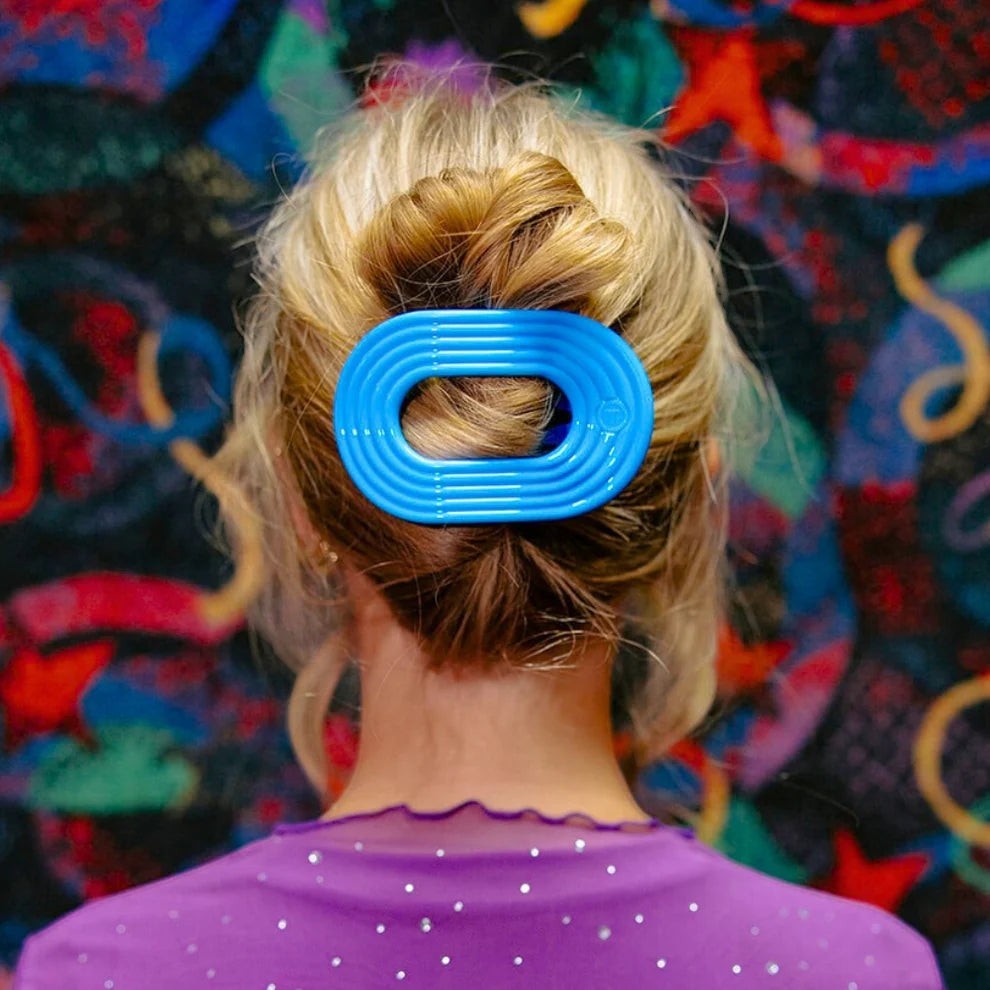 Doodlations Coffee Bar & Boutique Miami Vice blue oval hair clip with ribbed texture for updos and styling.