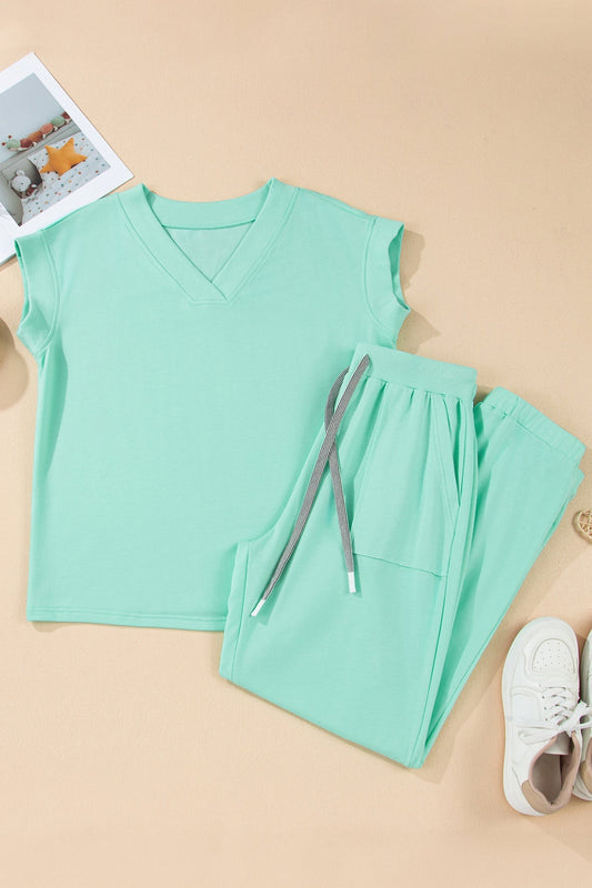 Doodlations Coffee Bar & Boutique mint green V-neck short sleeve top and drawstring pants lounge set with pockets.
