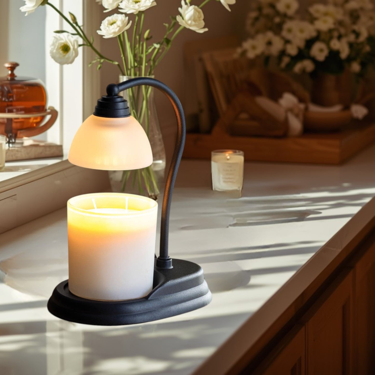 Aurora black candle warmer lamp with frosted shade and red candle.