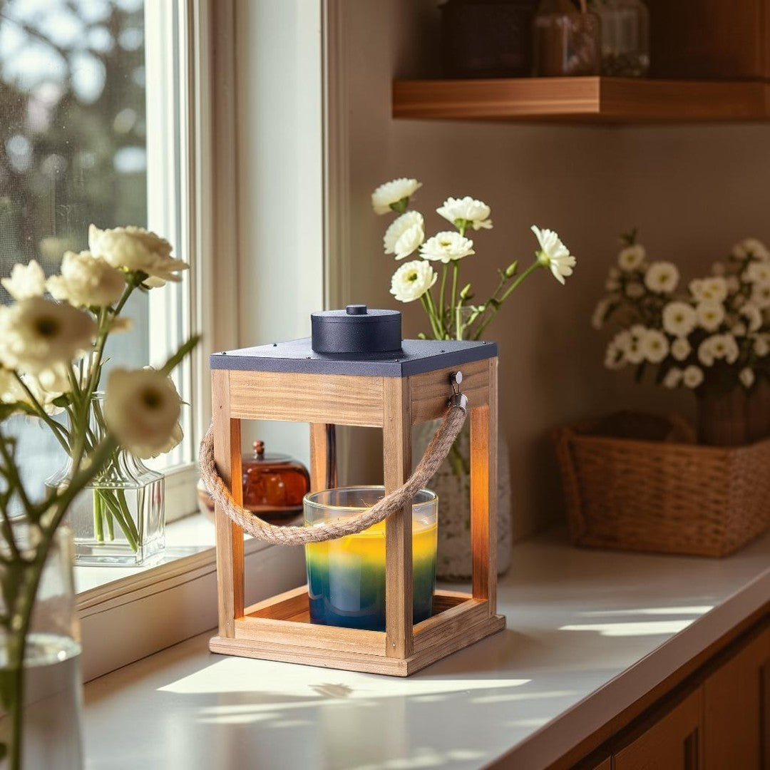 wood and rope candle warmer lantern with black top and silver accents.