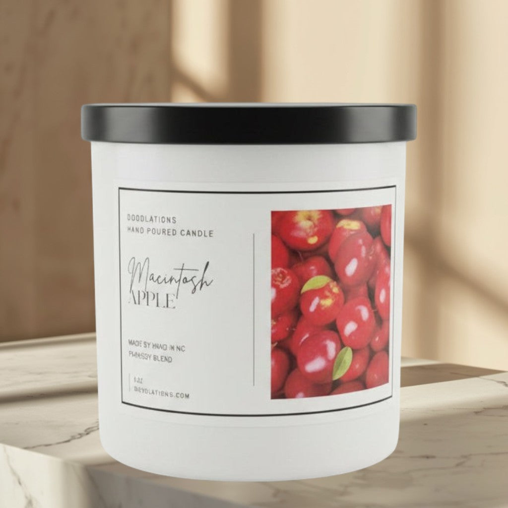 Inspired by the classic Yankee Candle favorite, this 8-ounce candle is hand-poured by us and delivers the crisp, true-to-nature scent of freshly picked Macintosh apples. With notes of green leaves, juicy pear, apple, smooth vanilla, and a hint of cedar, this fragrance captures that perfect "just off the tree" aroma. Bold and refreshing, it’s a timeless favorite for any space.