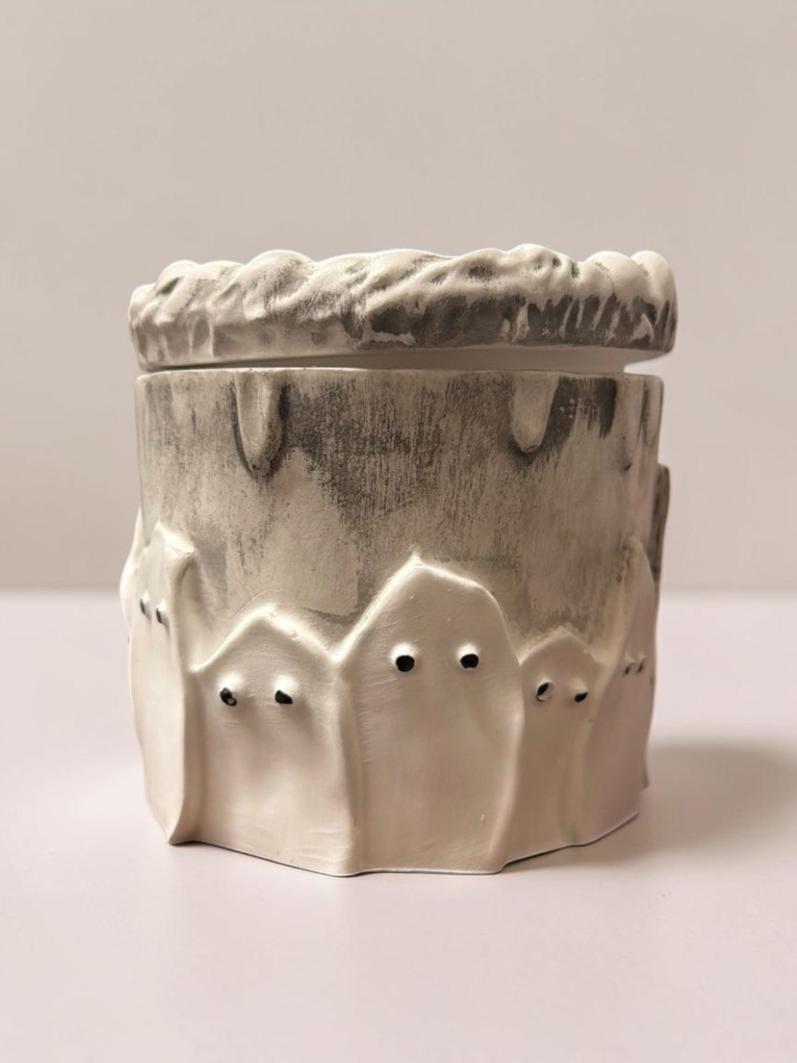 Doodlations Coffee Bar & Boutique concrete Boo ghost candle with a distressed grey and white finish