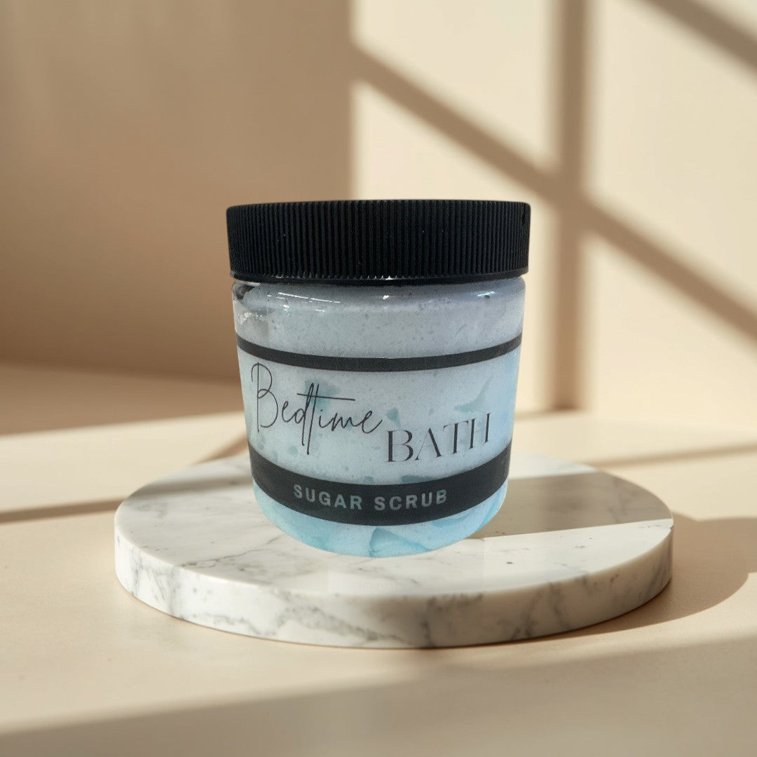Bedtime Bath sugar scrub in a clear jar with a black lid,