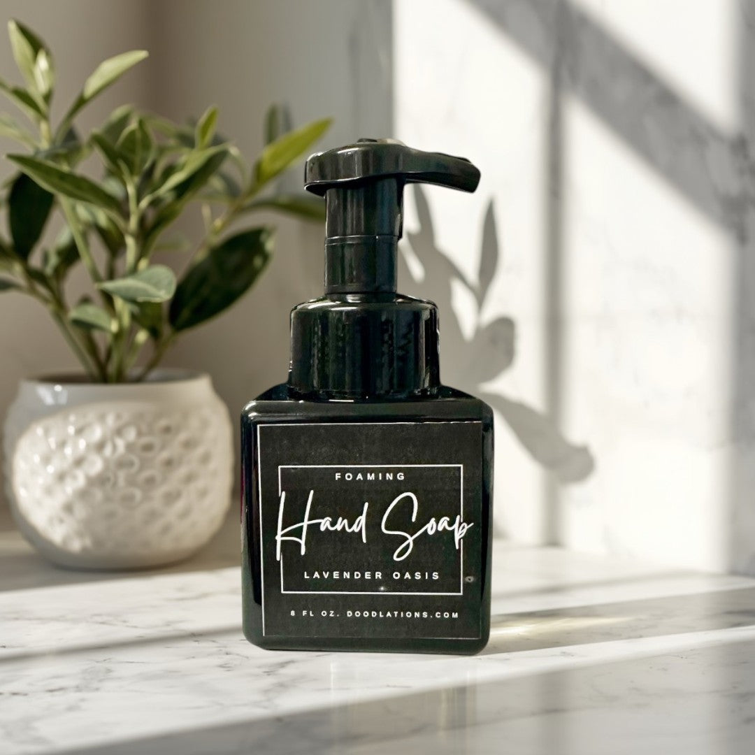 Lavender Oasis foaming hand soap in a black square bottle with a white label. 8 fl oz.