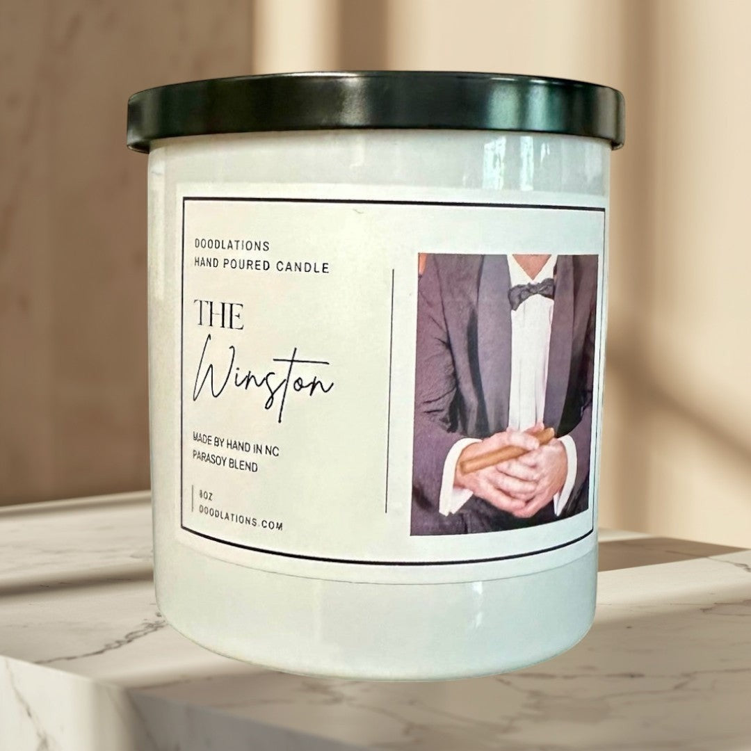 The Winston hand-poured candle with sweet tobacco, honey, amaretto, and oak notes.