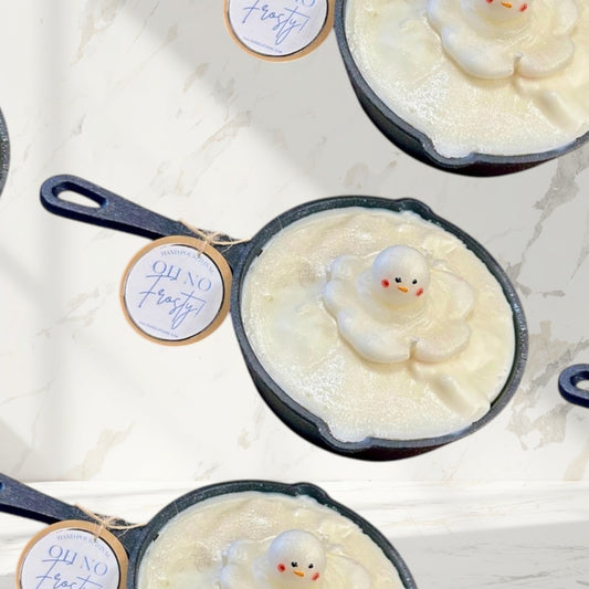 Melting Snowman Skillet candle, white wax with a melting snowman figure, holiday decor