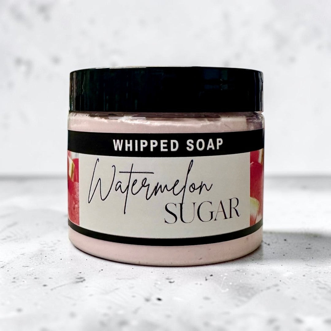 Doodlations Coffee Bar & Boutique Watermelon Sugar whipped soap in a 4 oz jar with a black lid and fruity label.