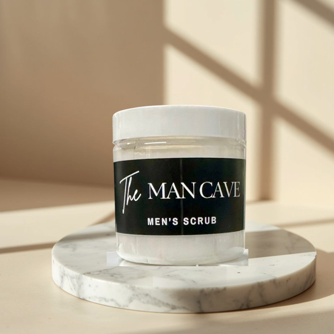 The Man Cave Men's Scrub, 4 oz jars stacked, white whipped soap with black label.