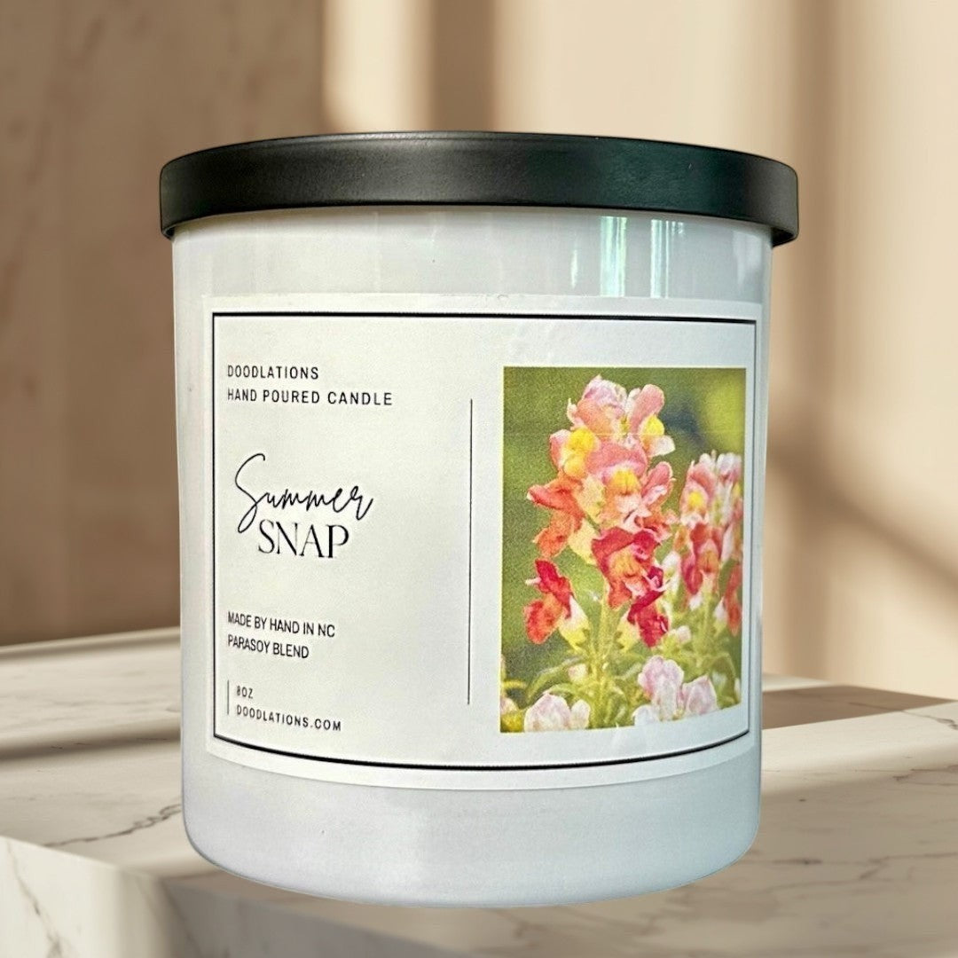 Summer Snap hand-poured parasoy blend candle with floral-fruity scent.