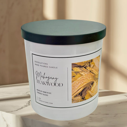 Mahogany Teakwood 8oz hand-poured soy blend candle with a black lid.