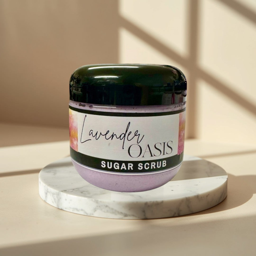 Lavender Oasis Sugar Scrub in a clear jar with a black lid. The scrub is lavender colored