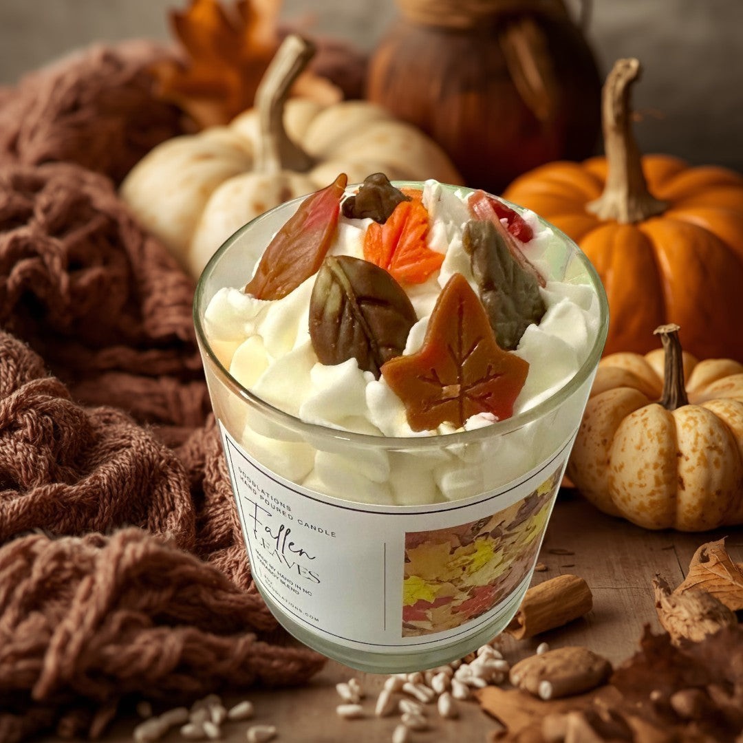 Fallen Leaves hand-poured candle with realistic wax leaves and autumn scent.