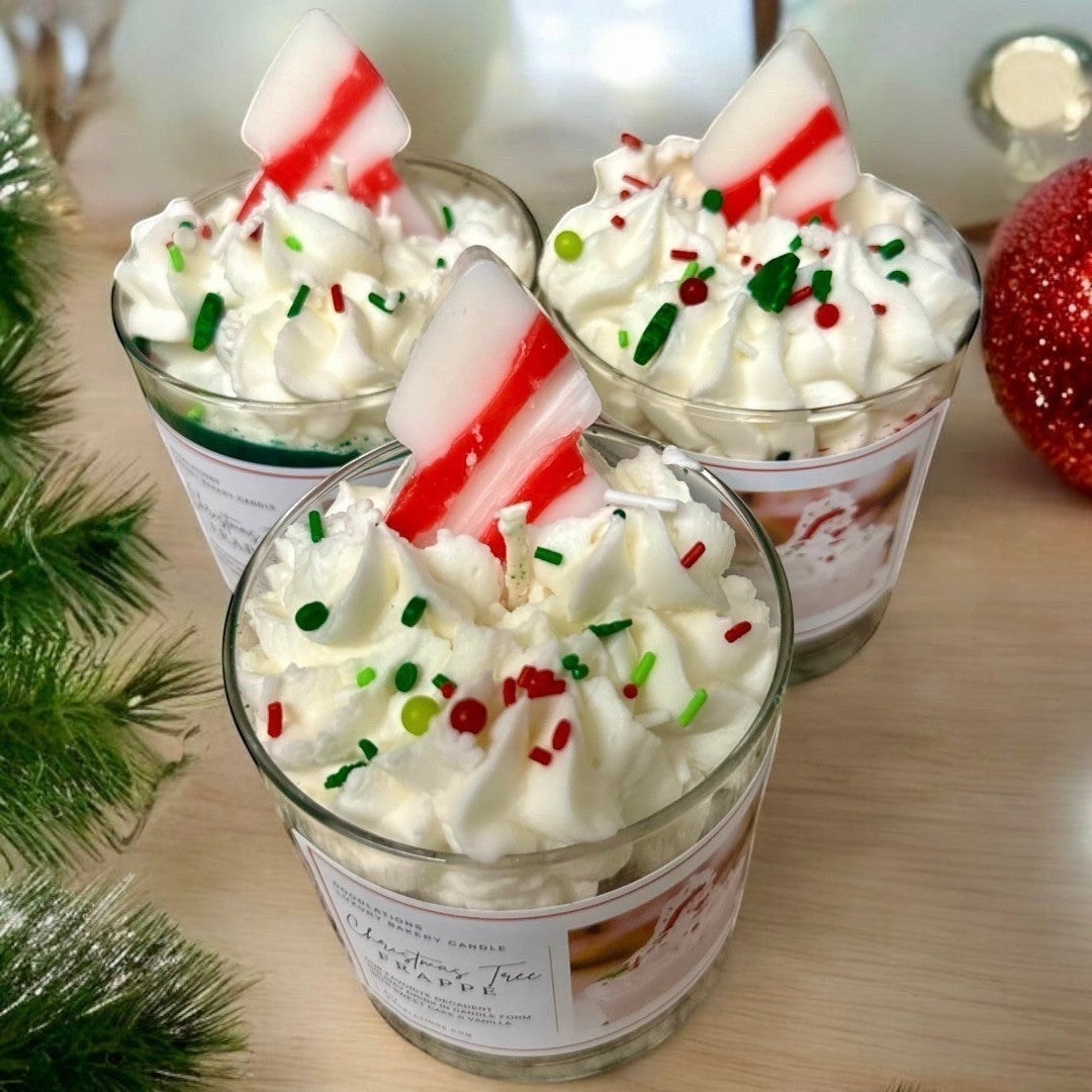 Christmas Tree Frappe candle with whipped wax topping, sprinkles, and candy cane accent.