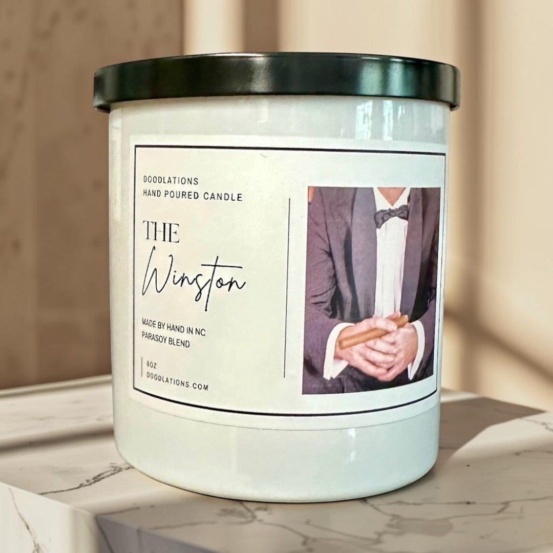 The Winston hand-poured candle with sweet tobacco, honey, amaretto, and oak notes.