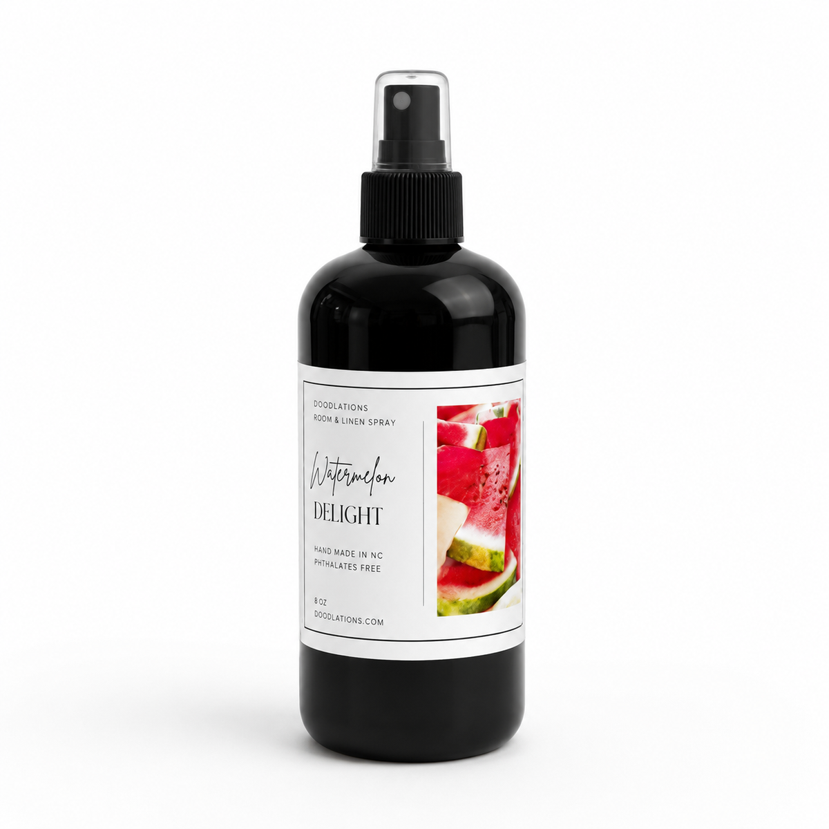 Doodlations Coffee Bar & Boutique Watermelon Delight room and linen spray in a black bottle with a white label.