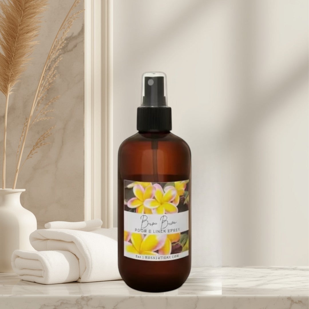 Bum Bum room and linen spray in amber bottle with floral label. Tropical scent.