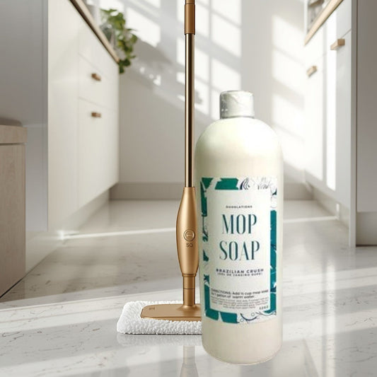 mop solution Brazilian Crush concentrated mop soap in a white bottle with a teal label.
