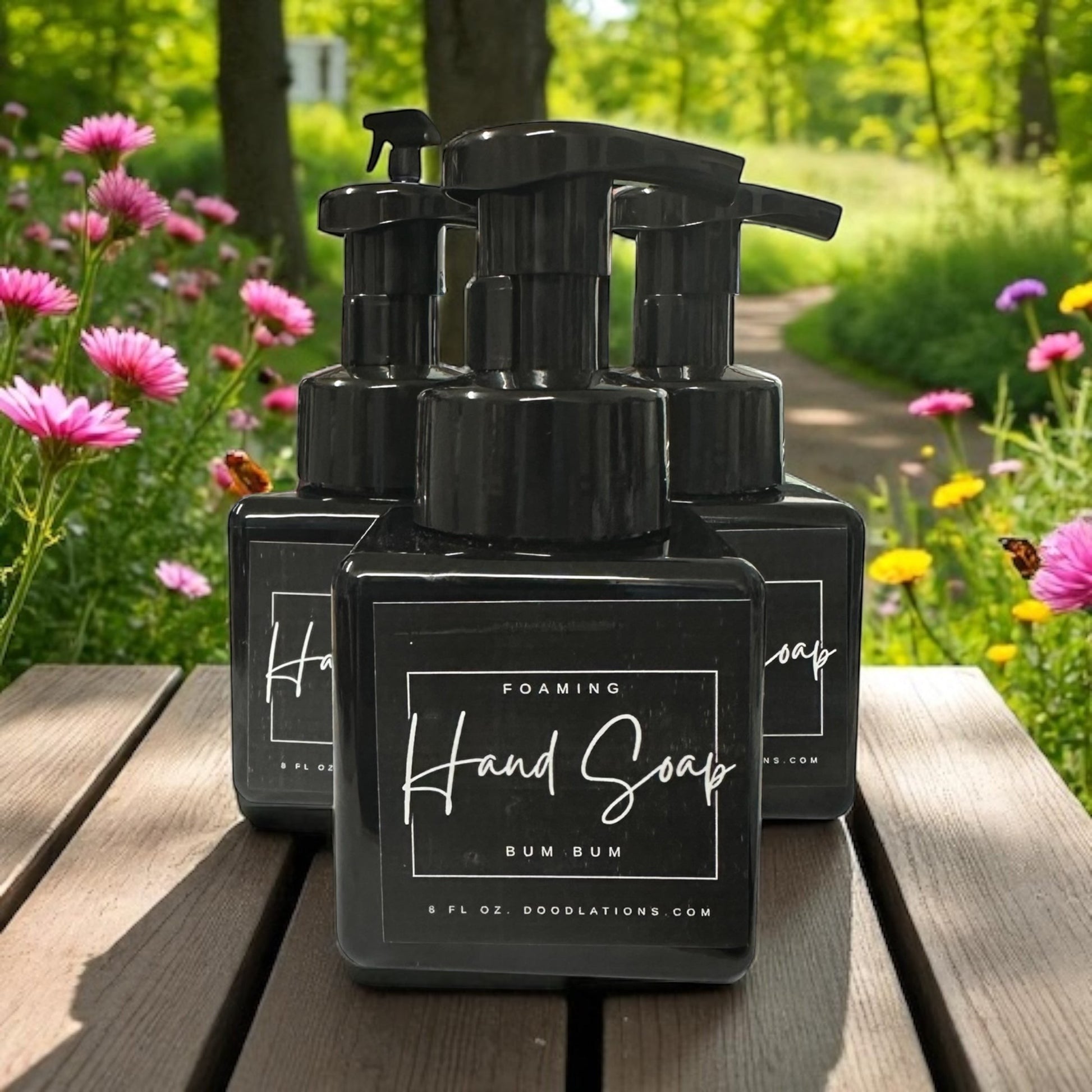 Doodlations Coffee Bar & Boutique Bum Bum foaming hand soap in a black bottle with a tropical floral background.