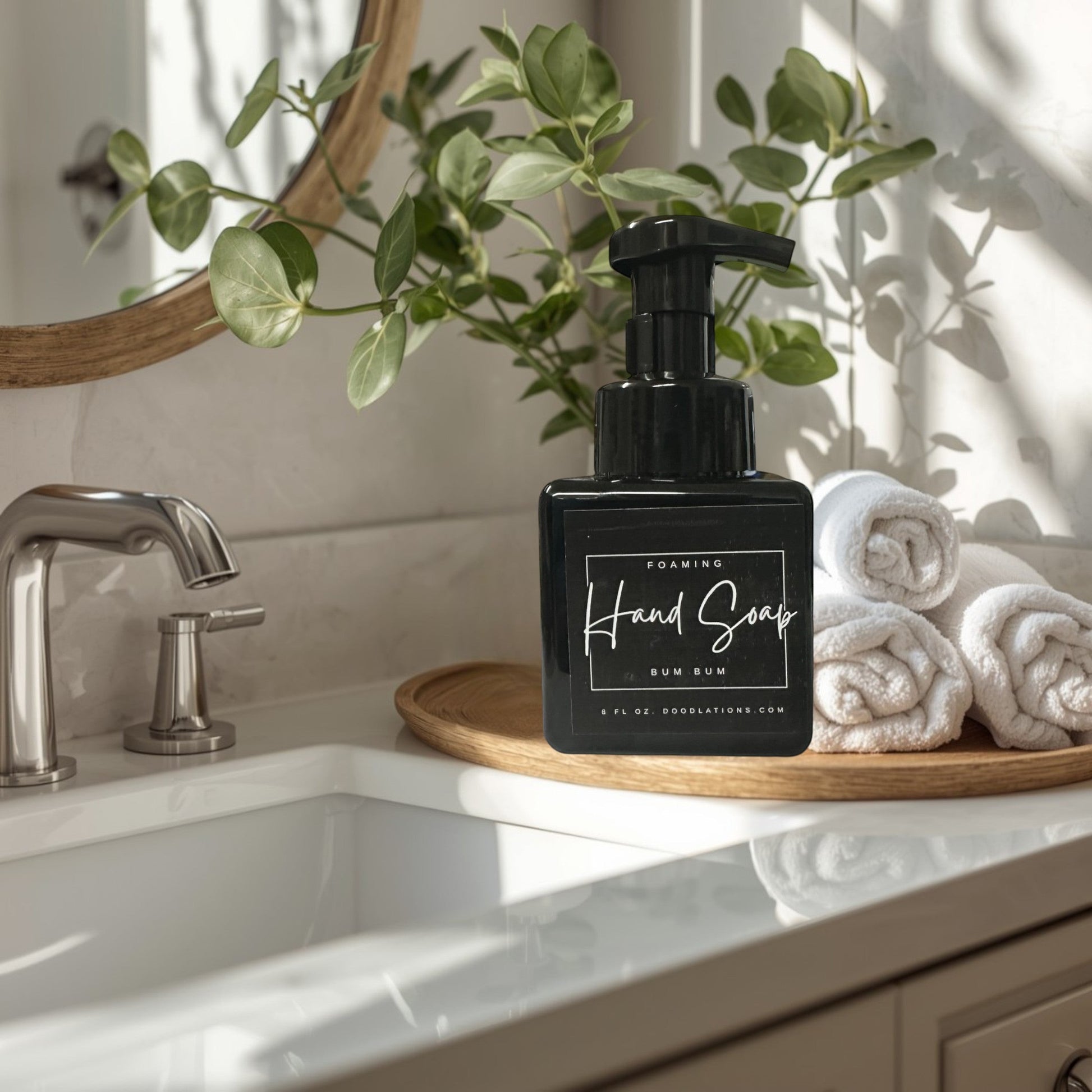 Bum Bum foaming hand soap in a black bottle with a tropical floral background.
