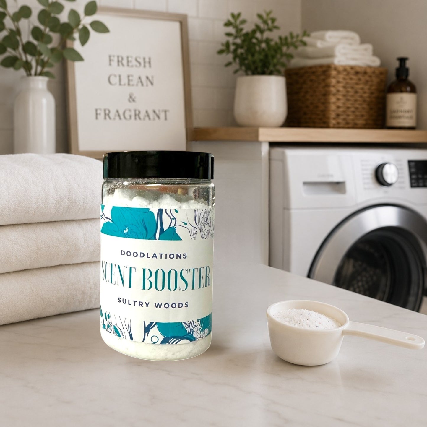 Doodlations Coffee Bar & Boutique Sultry Woods laundry scent booster in a clear plastic jar with a black lid. White granules fill the jar.