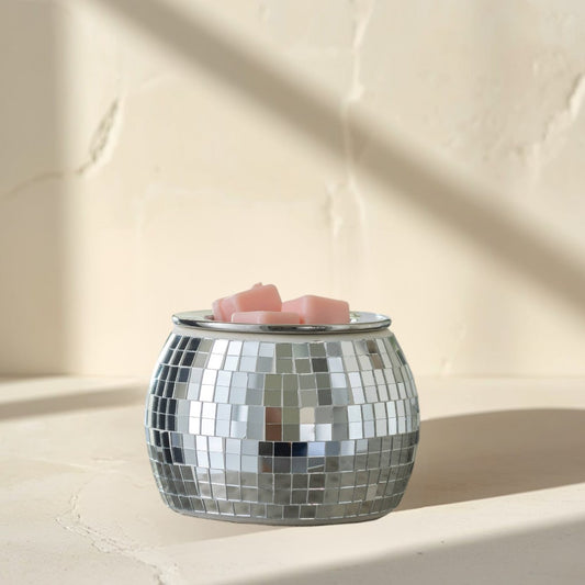 Disco Ball Fragrance Warmer with pink wax melts in a silver mirrored mosaic finish