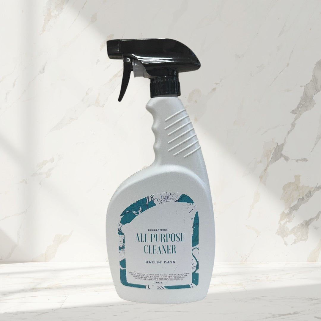 Doodlations All Purpose Cleaner in Darlin' Days scent, a white spray bottle with a teal floral label.