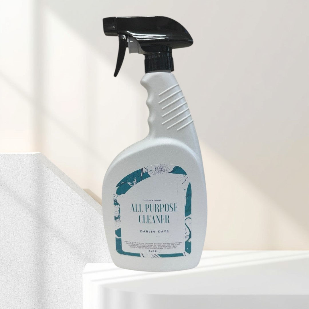 Doodlations All Purpose Cleaner in Darlin' Days scent, a white spray bottle with a teal floral label.
