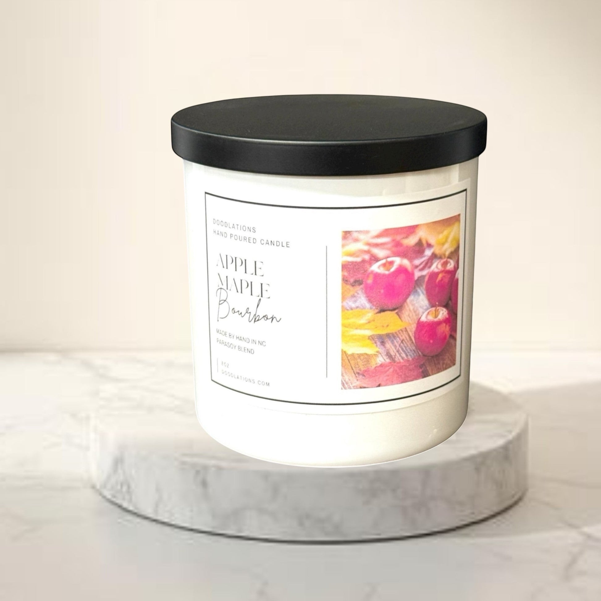 Doodlations hand poured Apple Maple Bourbon candle with para-soy blend wax. Autumnal scent with apple, maple, and bourbon notes.