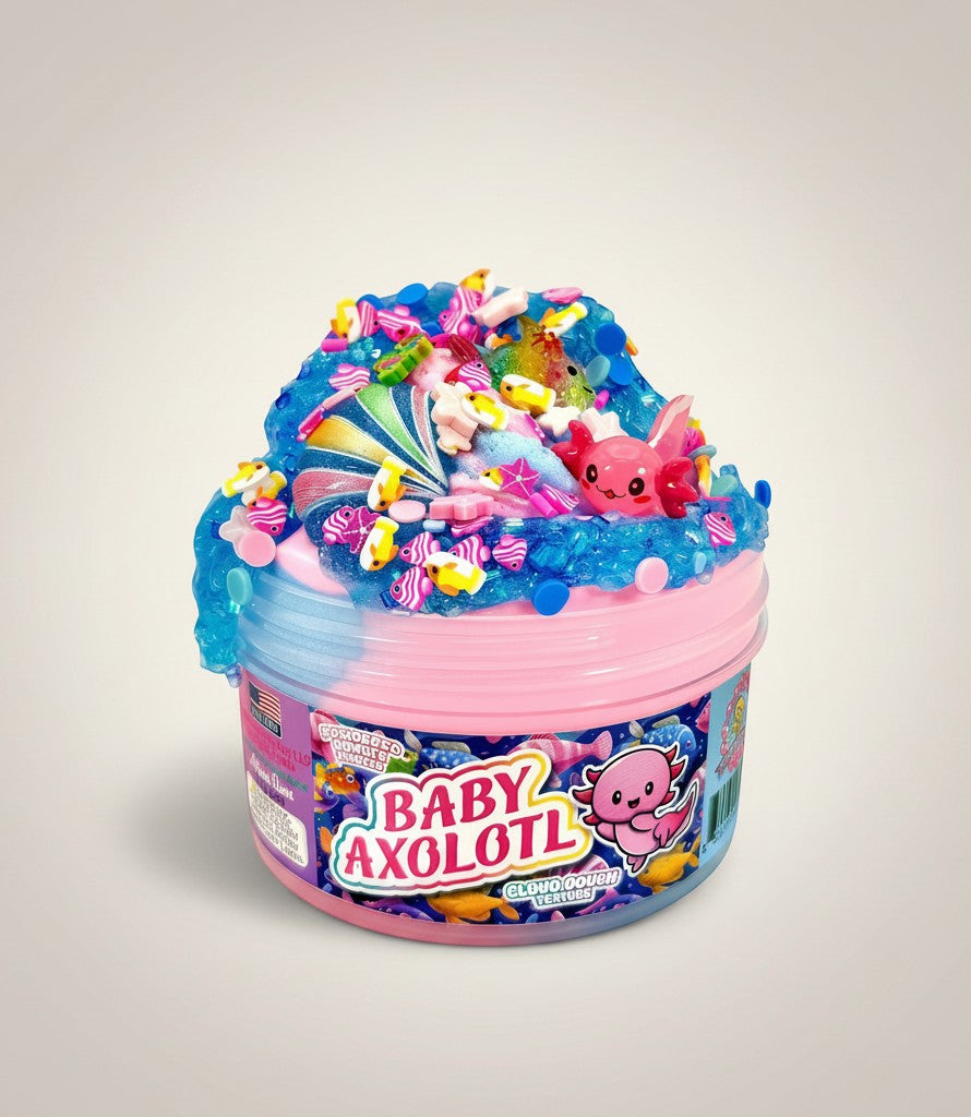 Doodlations Coffee Bar & Boutique Baby Axolotl slime with pink and blue swirls, ocean charms, and axolotl figure.