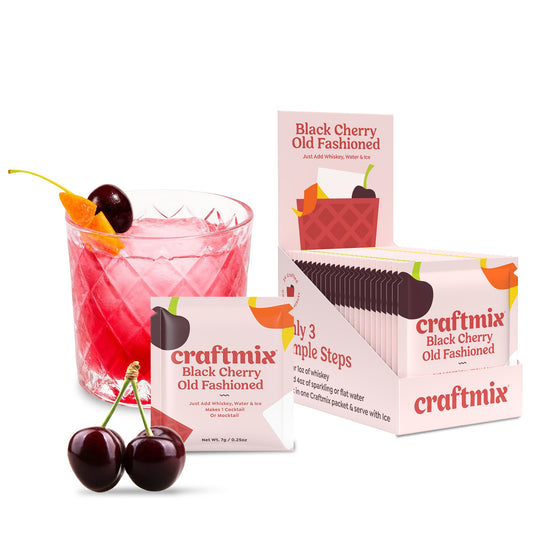 Doodlations Coffee Bar & Boutique Craftmix Black Cherry Old Fashioned cocktail mixer packet and prepared drink.
