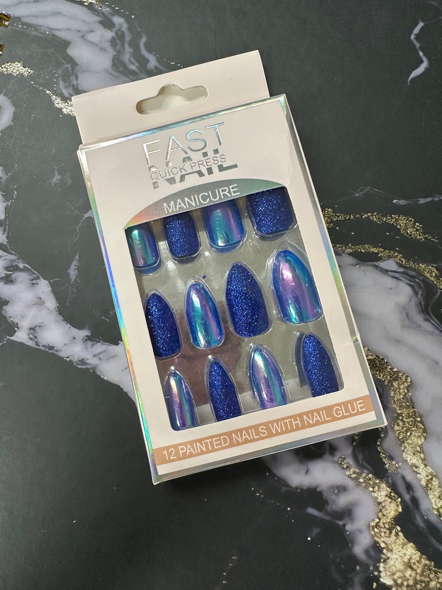Doodlations Coffee Bar & Boutique Fast Nails Quick Press Manicure set featuring 12 blue glitter and chrome finish press-on nails.