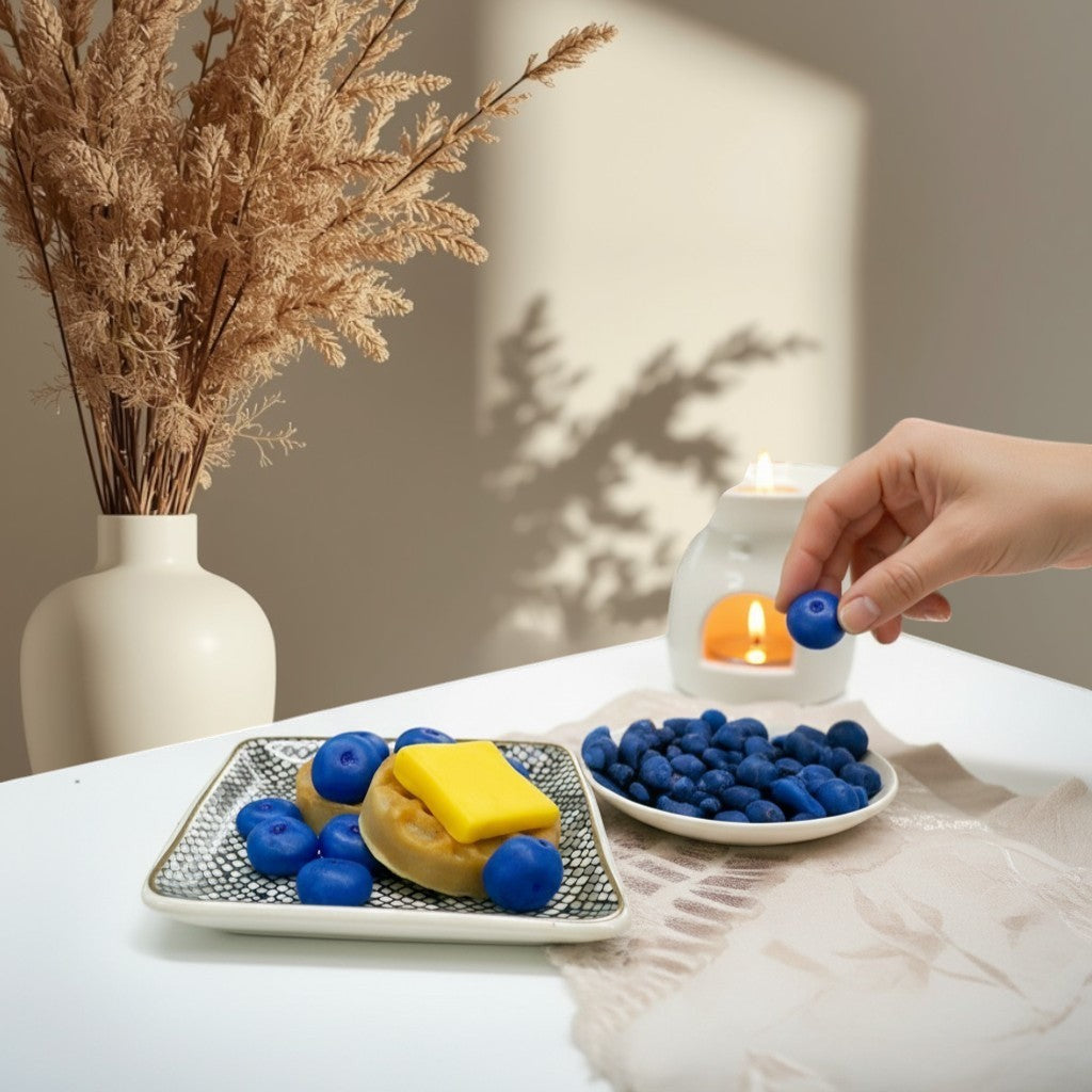 Doodlations Coffee Bar & Boutique Blueberry Waffle Wax Melts with blueberries and butter detail.